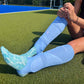 showing the Gryphon Shinguard Socks over shin guards.