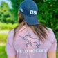 Model wearing the pink Field Hockey Dog Tee and hat