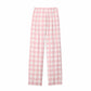 Pink and white checkered pants on a white background