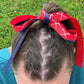 Girl wearing the Field Hockey Printed Grosgrain Ribbon in her hair