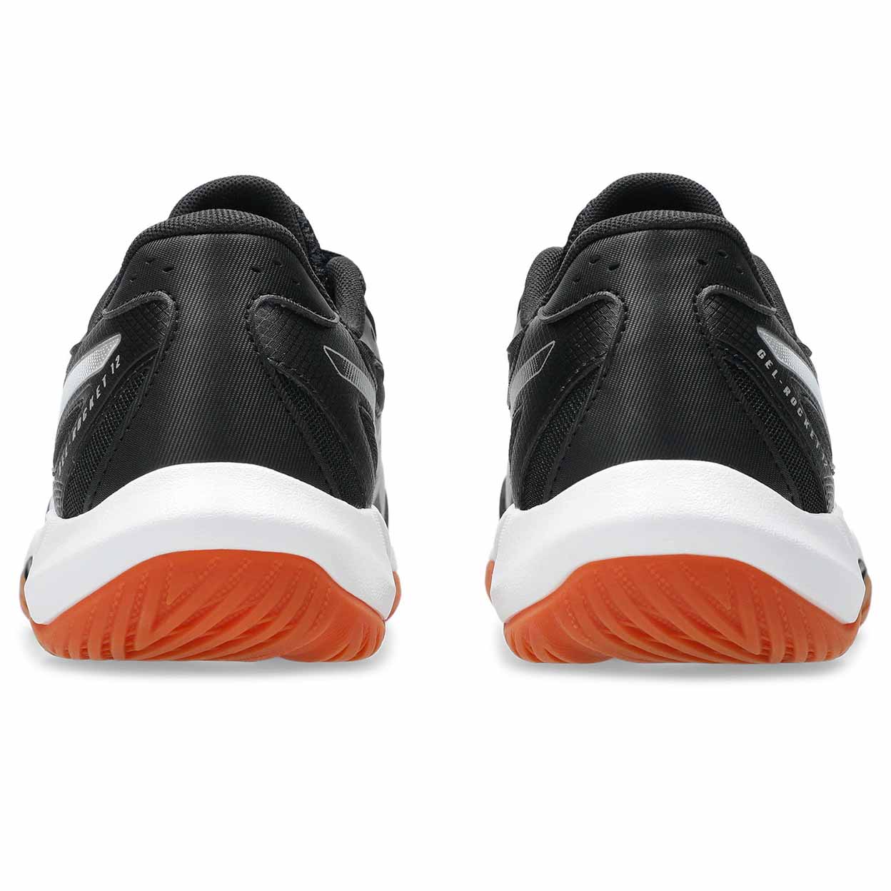 heels of the black ASICS Gel-Rocket 12 indoor court shoes with orange soles on a white background