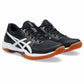 Black and orange athletic shoes on a white background