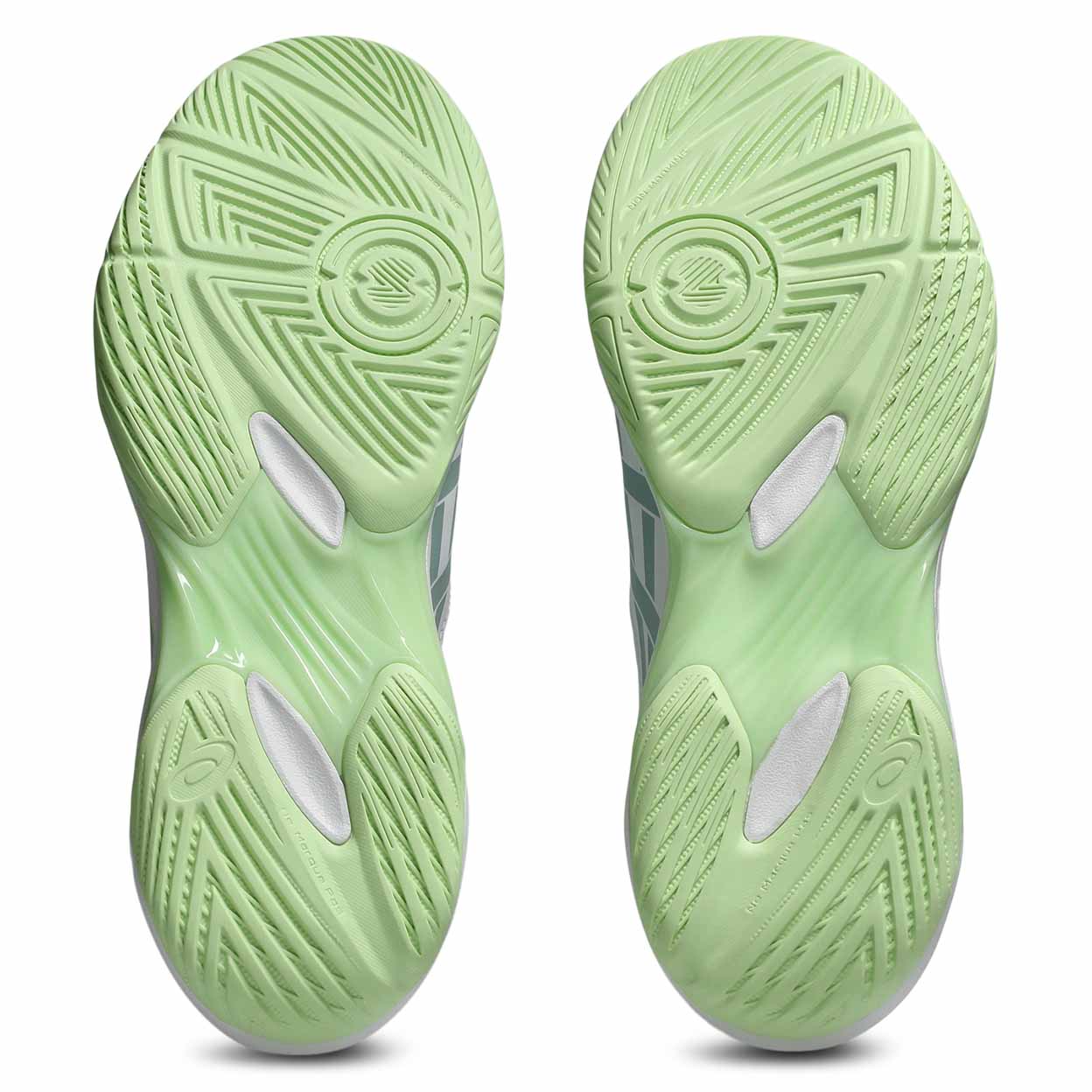 A pair of light mint green athletic shoe soles shown from the bottom against a white background.