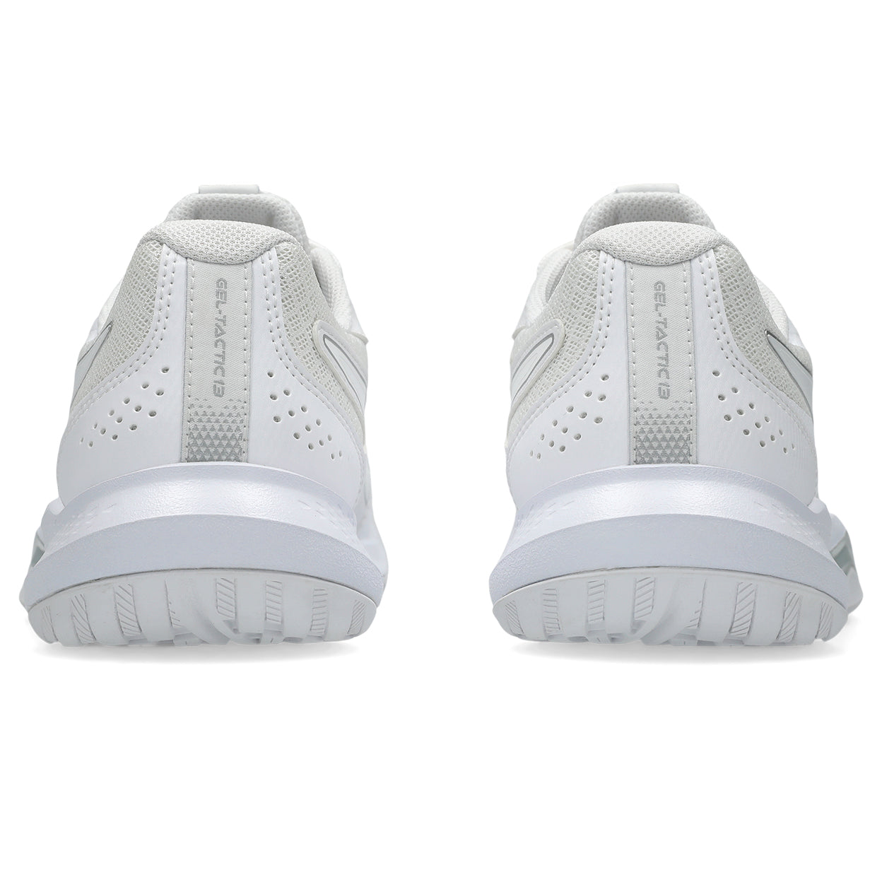 White athletic shoes with brand logo on a white background