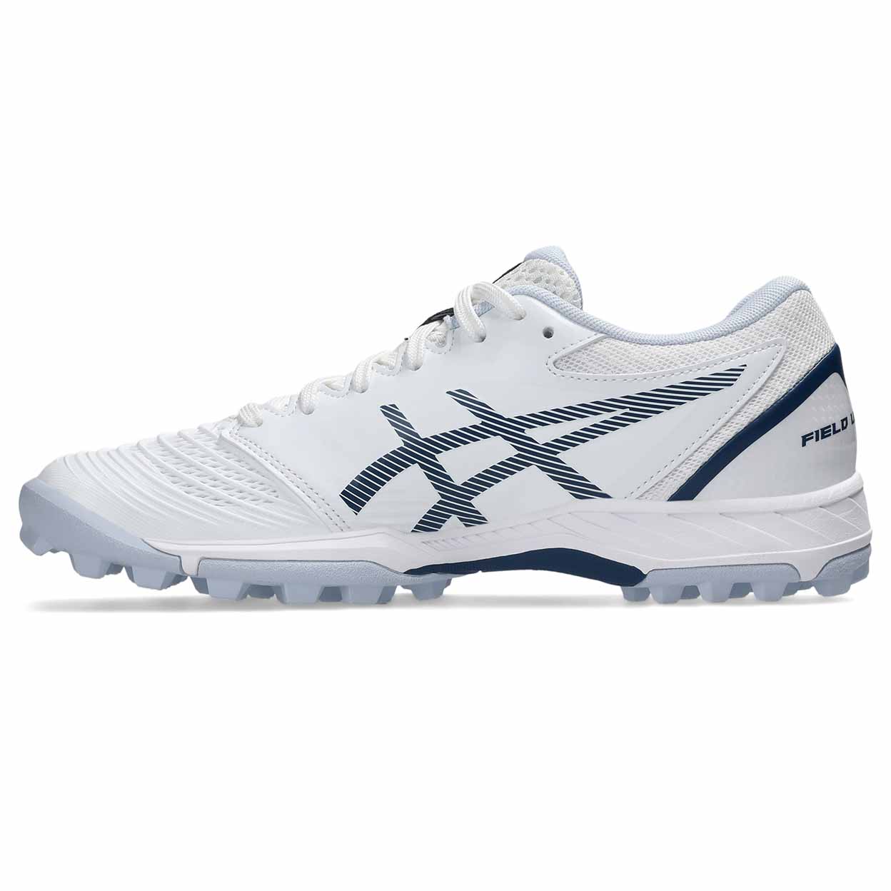 A white Asics field shoe with navy blue logo and heel accents, featuring a textured mesh upper and molded turf lugs, shown in a side profile on a white background.