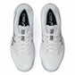 White turf shoes with black ASICS logo on a white background