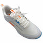 White athletic shoe with orange accents on a white background