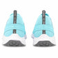 Light blue athletic shoes with white soles on a white background