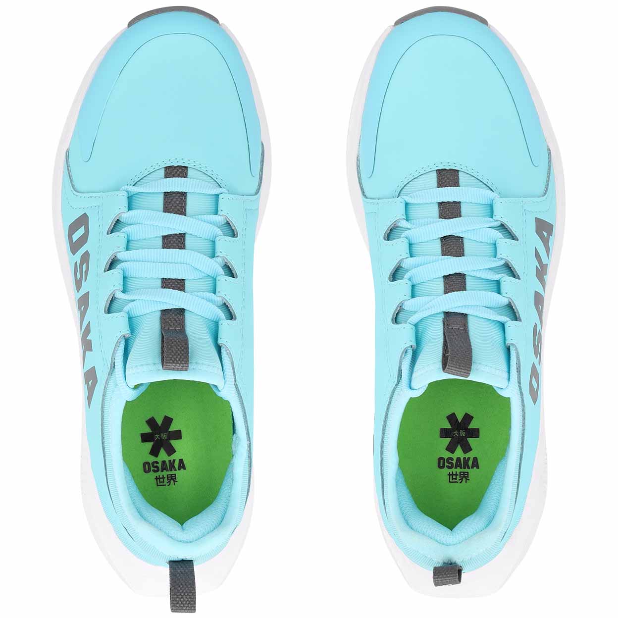 Light blue turf shoes with green accents and Osaka branding on a white background