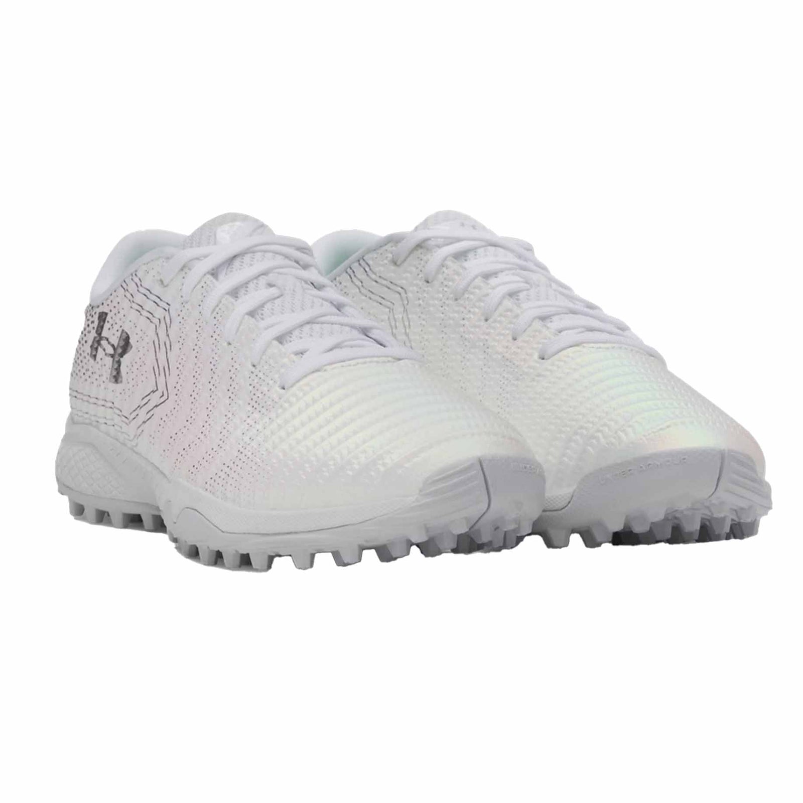 White sports shoes with cleats on a white background