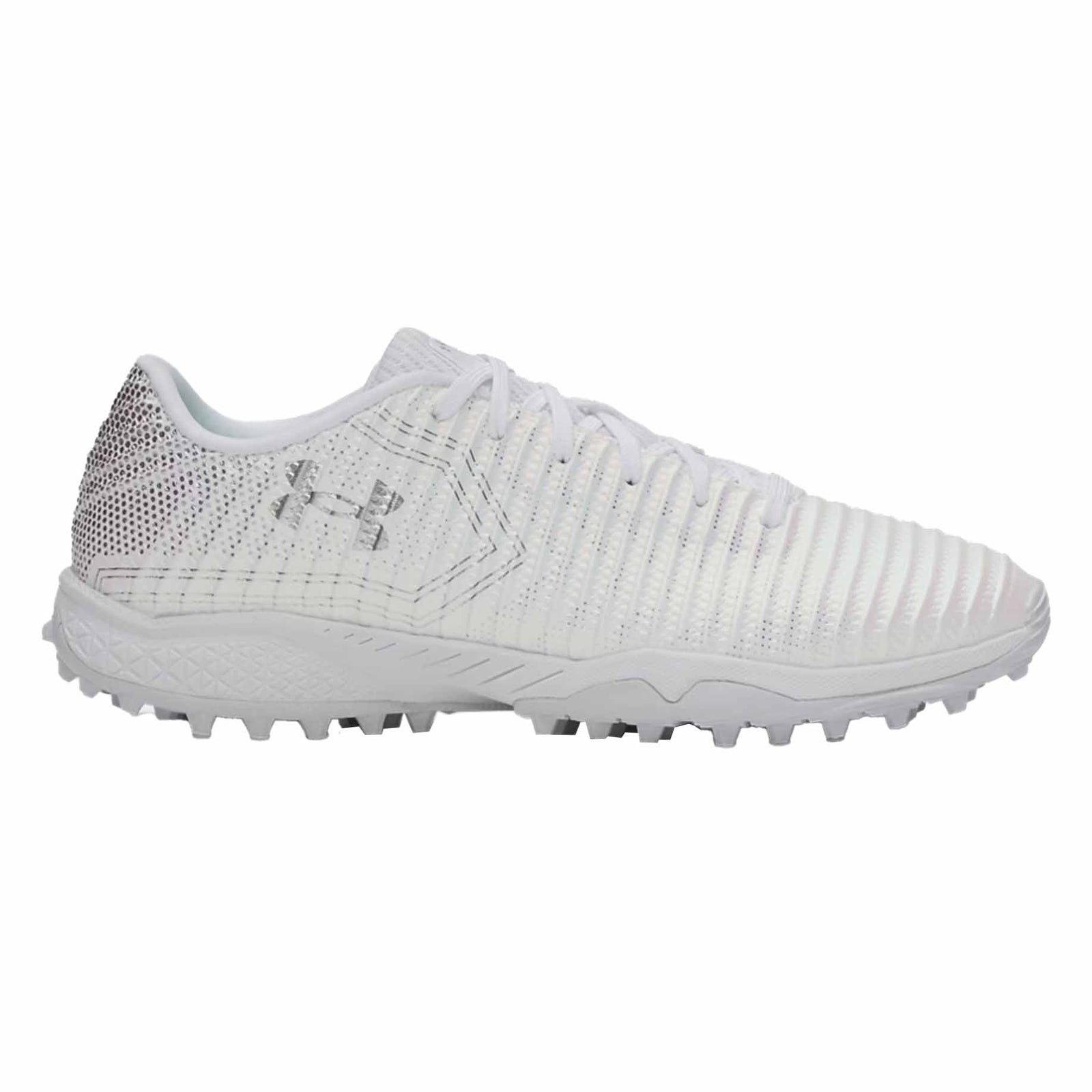 White turf shoe with a textured sole on a white background