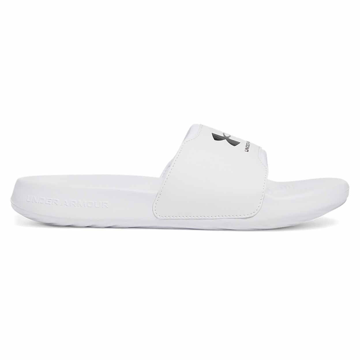 side view of the white Under Armour Women's Ignite Select Slides.