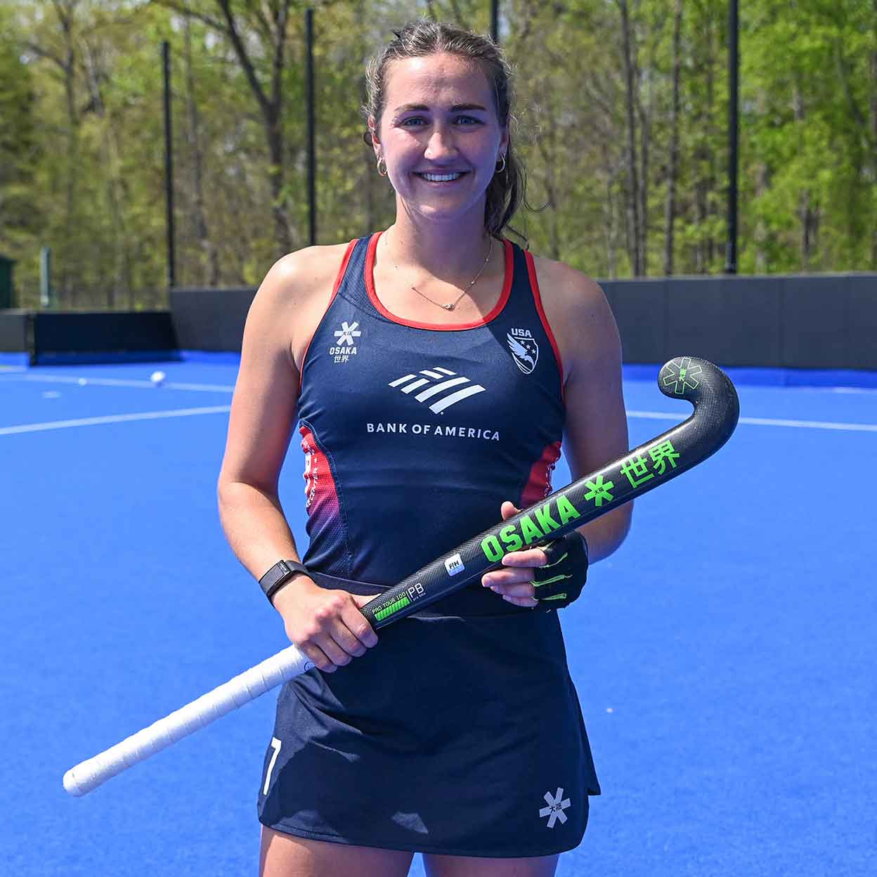 Field hockey player Jillian Wolgemuth holding an Osaka Pro Tour 100 Pro Bow Composite Field Hockey Stick