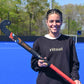 Player Amanda Golini holding a Ritual Velocity 95 Field Hockey Stick