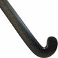 Closeup of black field hockey stick on white background.