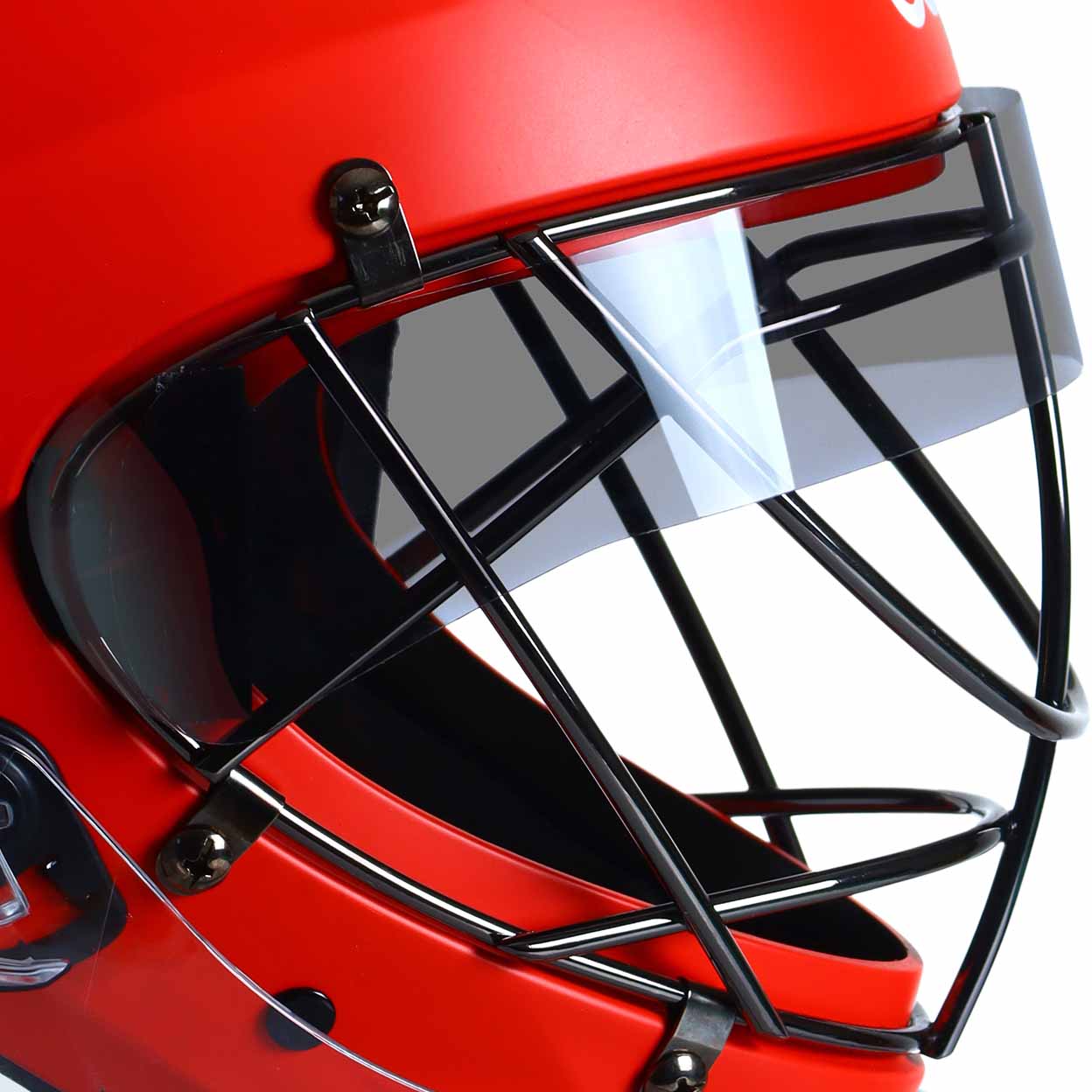 Detailed view of the right side of the same red OBO helmet, highlighting the clear and tinted helmet blinder mounted behind the face cage for anti-glare protection, with fastening points visible.