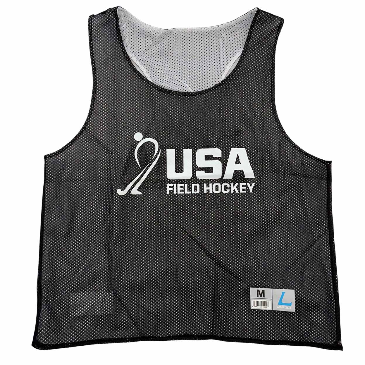 A black mesh athletic pinnee vest with a white 'USA FIELD HOCKEY' graphic on the front, displayed against a solid white background.
