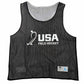A black mesh athletic pinnee vest with a white 'USA FIELD HOCKEY' graphic on the front, displayed against a solid white background.