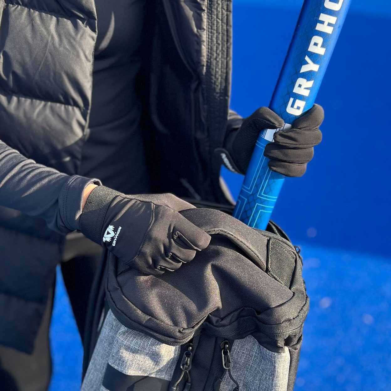 Player wearing the Gryphon G Fit G5 Field Hockey Gloves Pair.