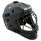 Black field hockey goalie mask with a metal face cage, ventilation holes, and adjustable straps, shown at an angle on a white background.