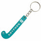 Teal keychain shaped like a hockey stick with 'Gryphon' branding on a white background