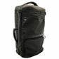 Black travel bag with wheels on a white background