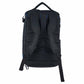 Black backpack shown from the back on a white background