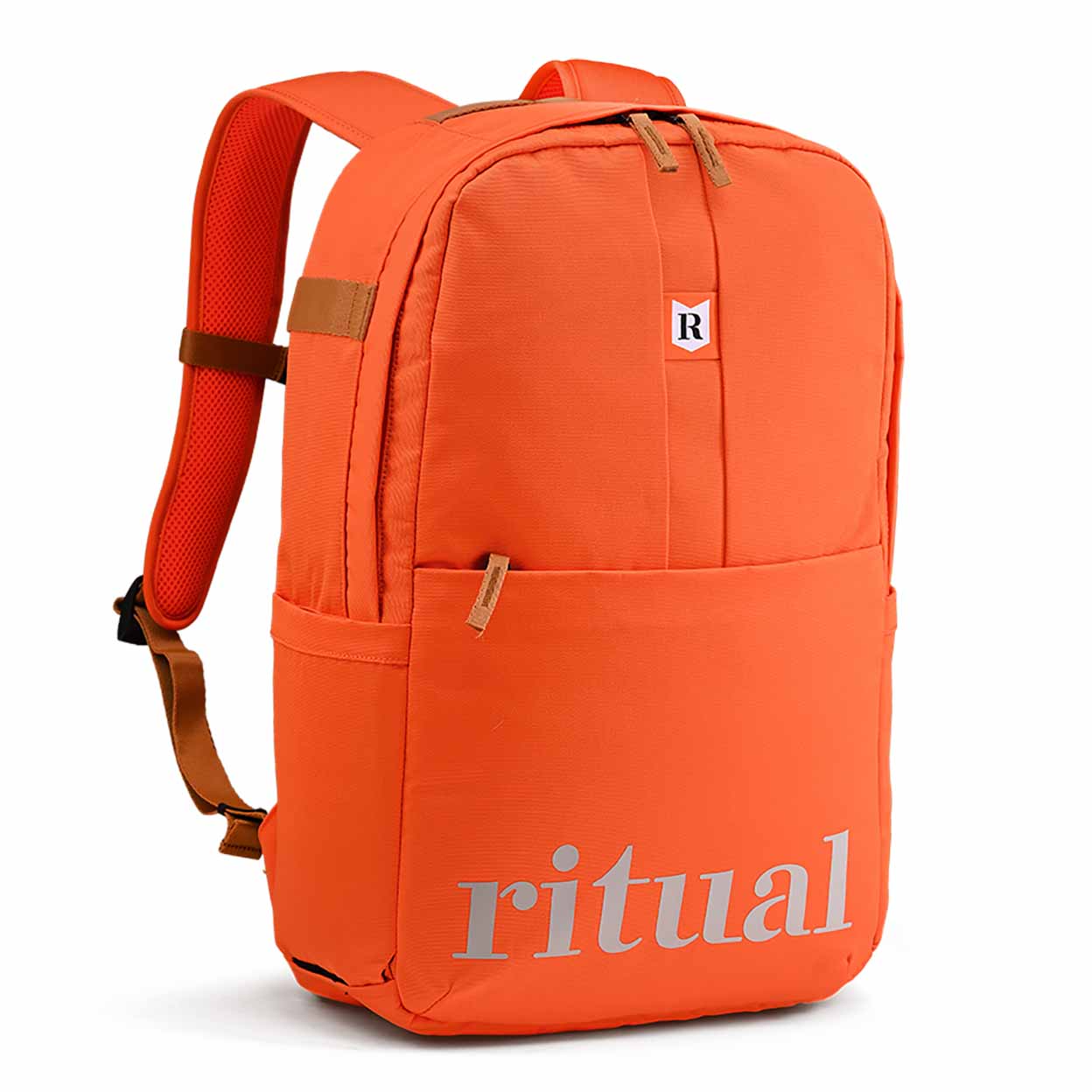 Orange backpack with 'ritual' branding on a white background