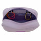 Purple zippered pouch with jewelry inside on a white background
