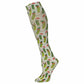 Off-white knee-high sock with a repeating print of pickles wearing Christmas hats and reindeer antlers, connected by string lights.
