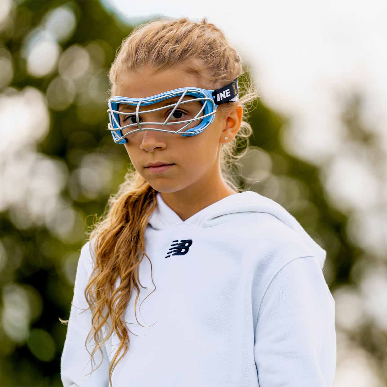 Girl wearing the Brine Dynasty Rise Dual Sport Goggles.