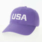 Purple cap with 'USA' text on a white background