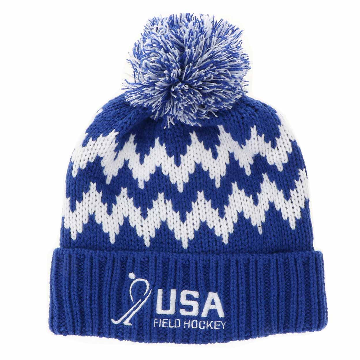 Blue and white knit beanie with pom-pom and USA Field Hockey logo on a white background