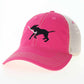 A pink trucker-style baseball cap with a white mesh back and a black embroidered dog graphic holding a white stick on the front panel.