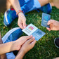 field hockey players sitting around holding MatchPlay Cards