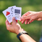 coaches hand holding several MatchPlay Cards