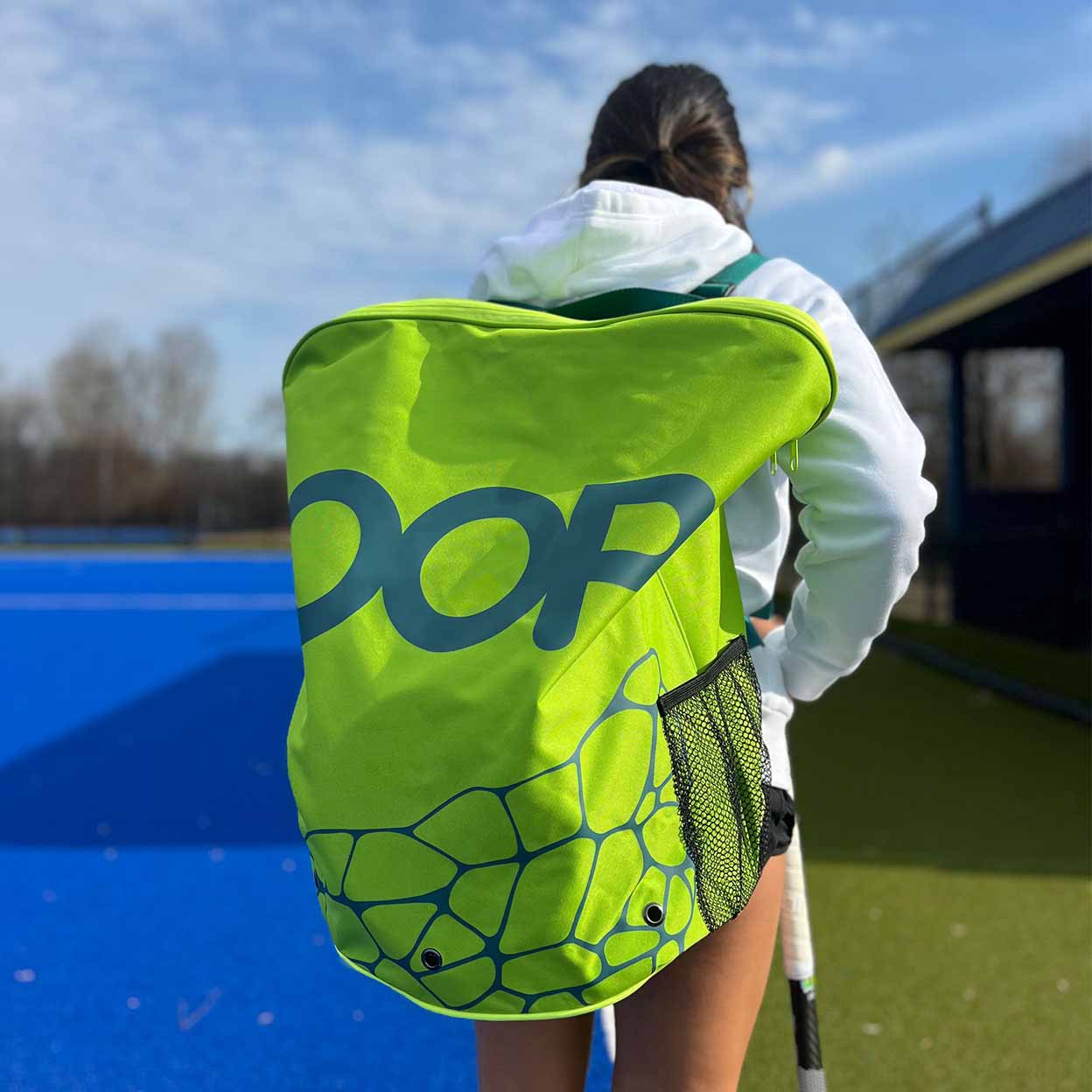 OOP CarryMe Penalty Corner Baggirl carrying the OOP CarryMe Penalty Corner Bag on her back.