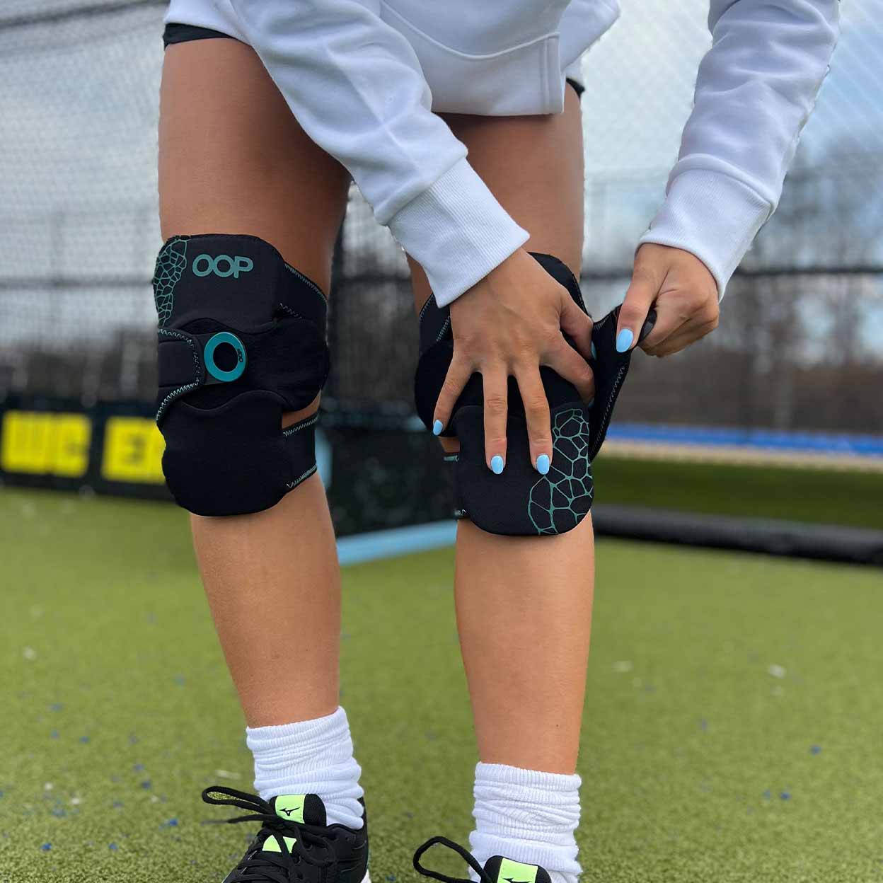 player putting on OOP BeesKnees Penalty Corner Protectors.