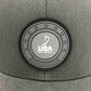 Close up of the silicon patch on the USA Field Hockey Trucker Hat