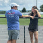 father in a Field Hockey Dad Pocket Tee with daughter hockey player.