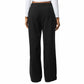 Black wide-leg pants worn by a person on a white background