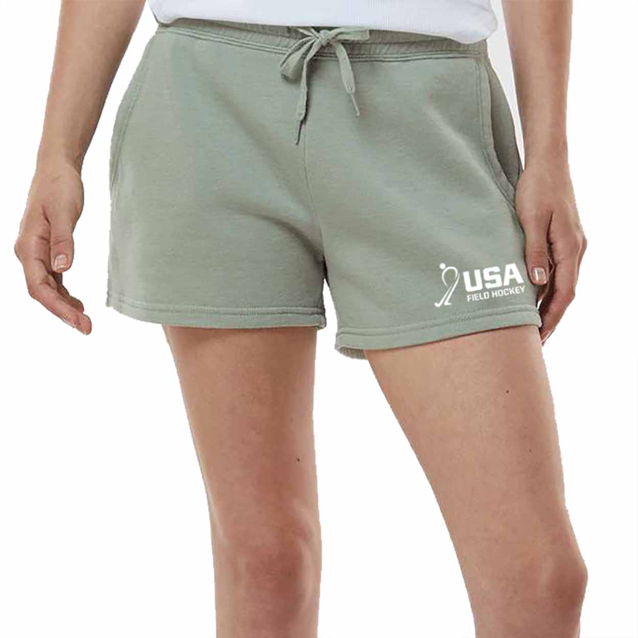 a model wearing the green USA Field Hockey Fleece Shorts