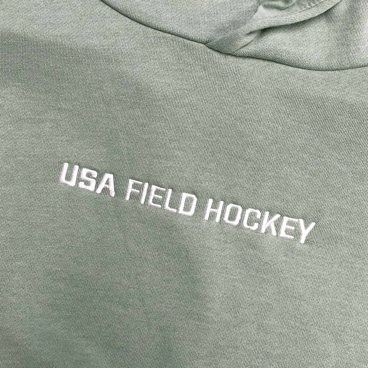 Detail showing the embroidered words USA field hockey.