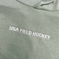 Detail showing the embroidered words USA field hockey.