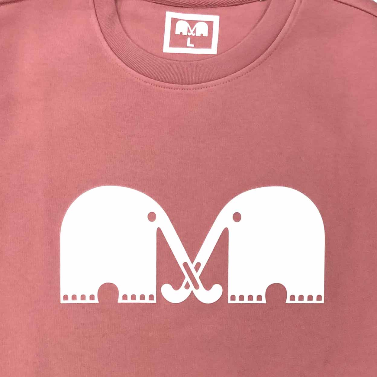 Pink t-shirt with white elephant design and logo on a pink background