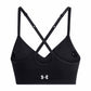 Black sports bra with criss-cross straps on a white background