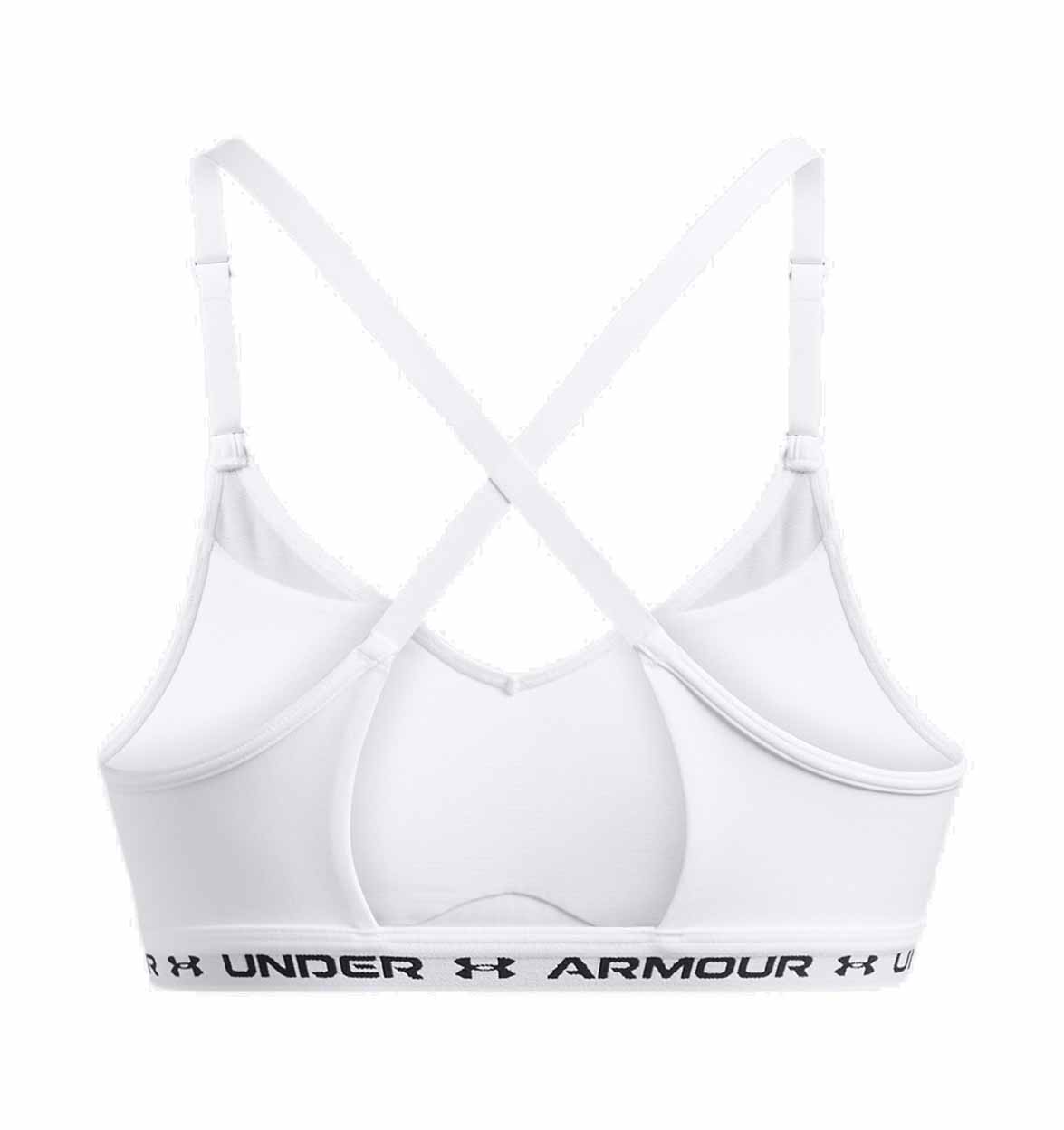 White sports bra with criss-cross straps and Under Armour branding on a white background