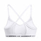 White sports bra with criss-cross straps and Under Armour branding on a white background