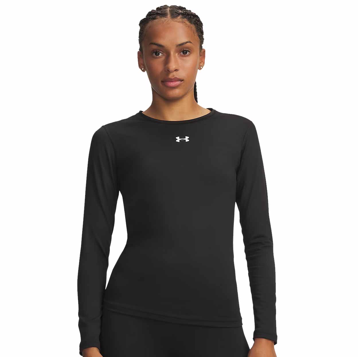 A woman modeling a black long-sleeve athletic top with a small white Under Armour logo on the chest, set against a plain white background.