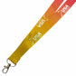 A yellow-to-orange gradient lanyard with white USA Field Hockey branding and a silver metal lobster clasp, shown on a plain white background.